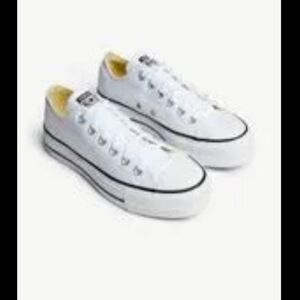 Woman's white converse chunk sneakers